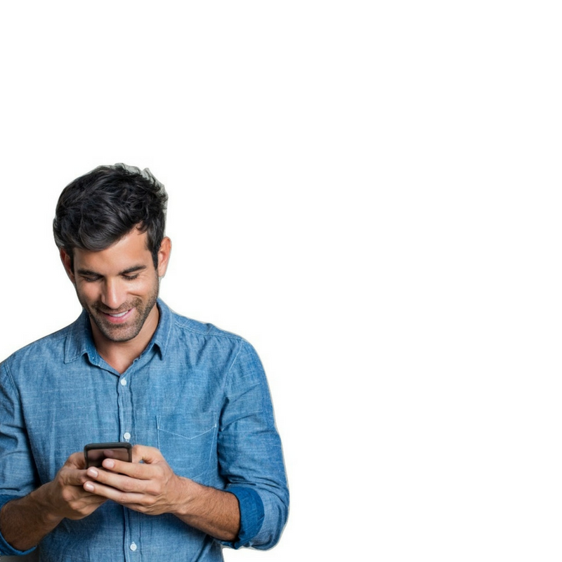 photo of a man wearing a blue shirt looking at his phone