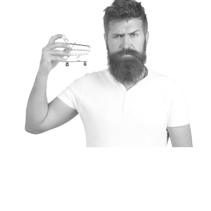 bearded man looking at you holding a mini shopping trolley up in his right hand